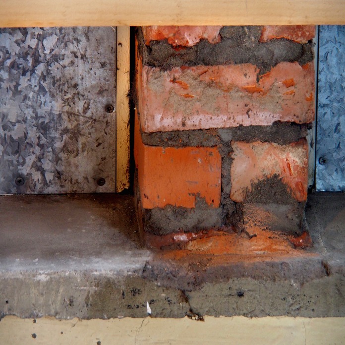 fast, in its prison-walls of earth